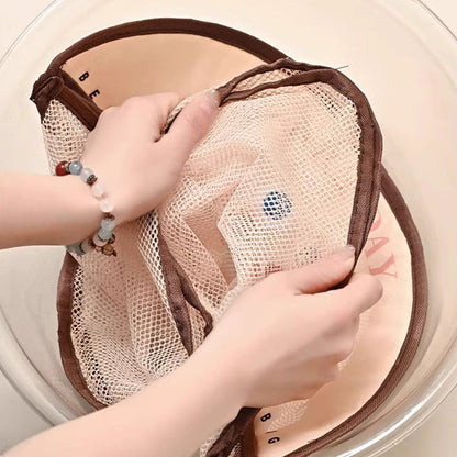 Multi-purpose storage bag with visible mesh for hanging.